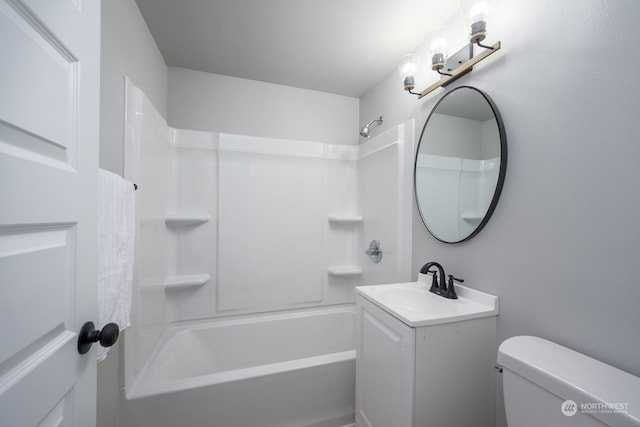 full bathroom featuring toilet, vanity, and bathing tub / shower combination