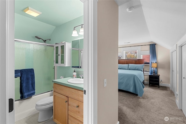 full bathroom with shower / bath combination with glass door, lofted ceiling, toilet, and vanity