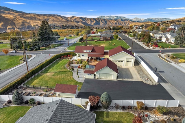 drone / aerial view featuring a mountain view