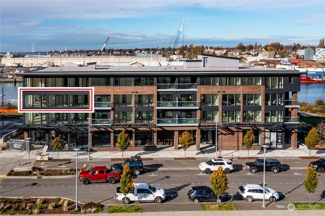 view of building exterior with a water view