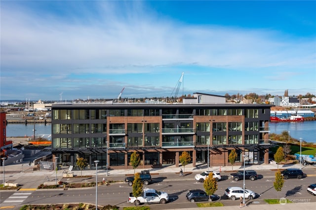 view of building exterior with a water view