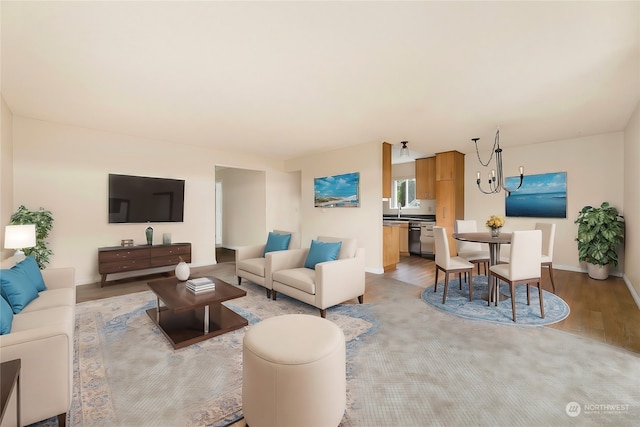 living room featuring light hardwood / wood-style floors and sink