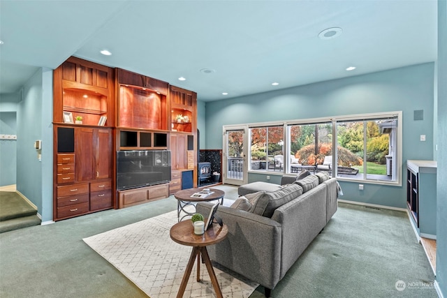 living room featuring light carpet