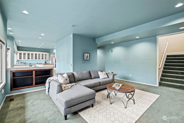 living room with bar and carpet