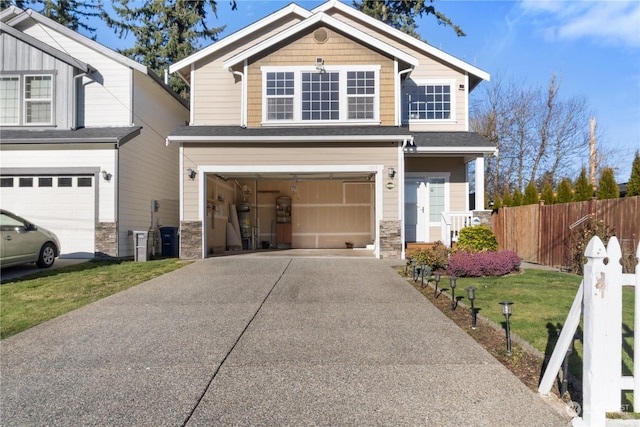 craftsman inspired home with a garage and a front lawn