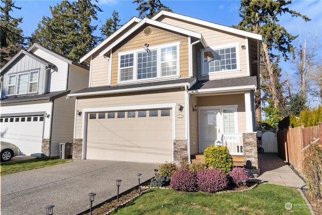 craftsman inspired home with a garage