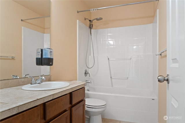 full bathroom with shower / tub combination, vanity, and toilet