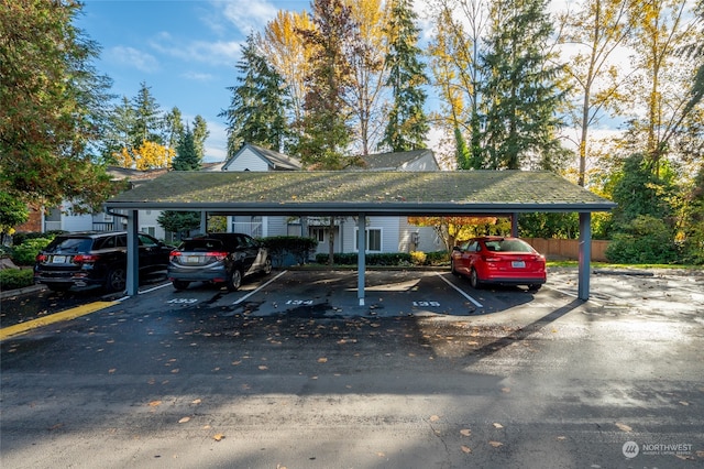 view of vehicle parking featuring a carport