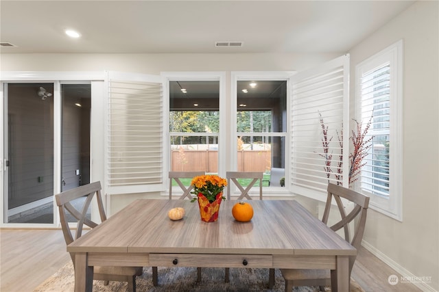 dining area with light wood-type flooring