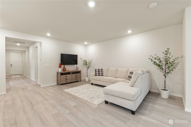 living room featuring light hardwood / wood-style flooring