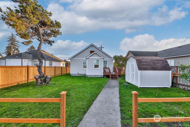 exterior space with a shed and a lawn