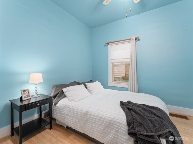 bedroom featuring ceiling fan and light wood-type flooring