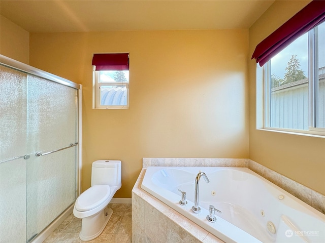 bathroom with tile patterned flooring, a healthy amount of sunlight, toilet, and shower with separate bathtub