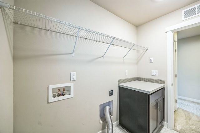 washroom with cabinets, hookup for a washing machine, light carpet, and hookup for an electric dryer