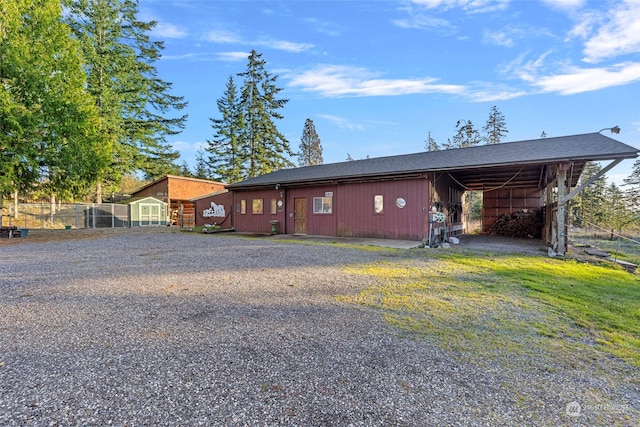 view of front of property with an outbuilding