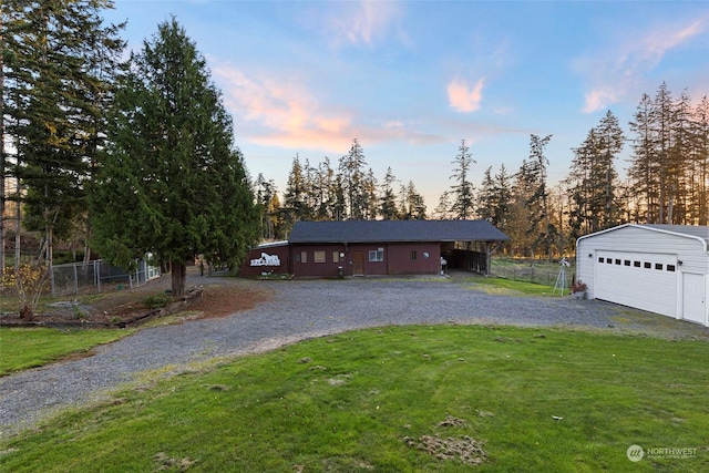 288 Torrence Ln, Oak Harbor, WA 98277 - view of front facade with a garage, an outbuilding, and gravel driveway