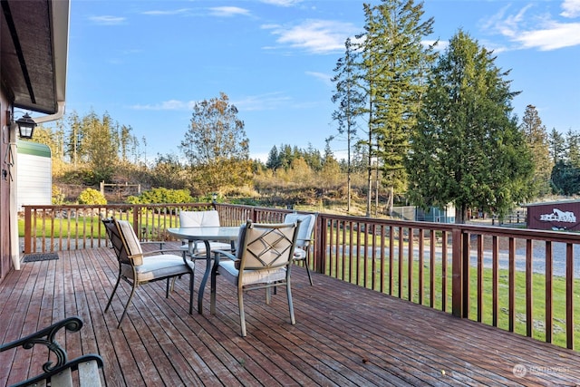 288 Torrence Ln, Oak Harbor, WA 98277 - wooden deck with outdoor dining area and a yard