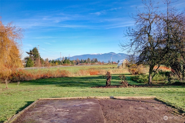 view of mountain feature with a rural view