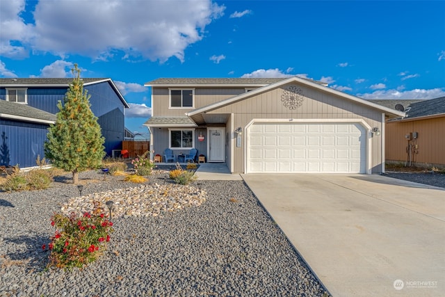 view of front of property with a garage