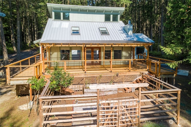 view of front of property featuring a wooden deck