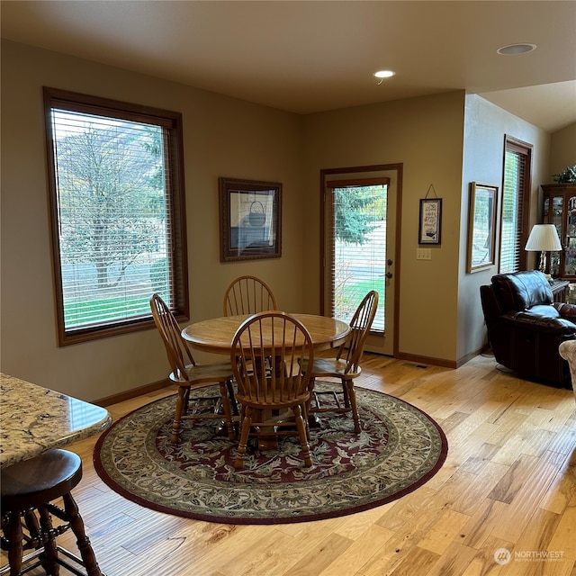 dining room with light hardwood / wood-style floors