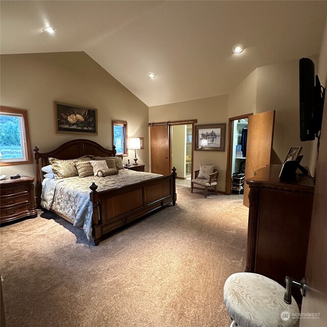 carpeted bedroom featuring vaulted ceiling