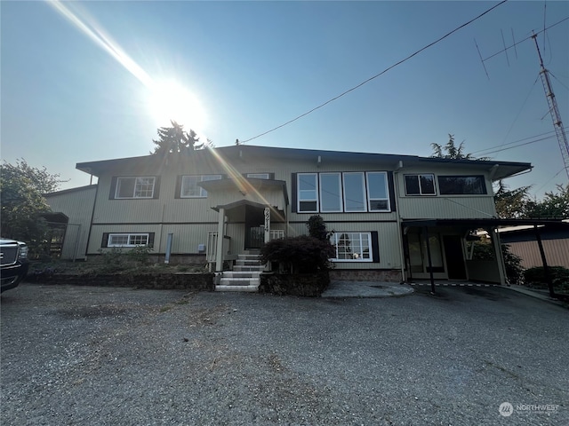 view of front of house featuring a carport