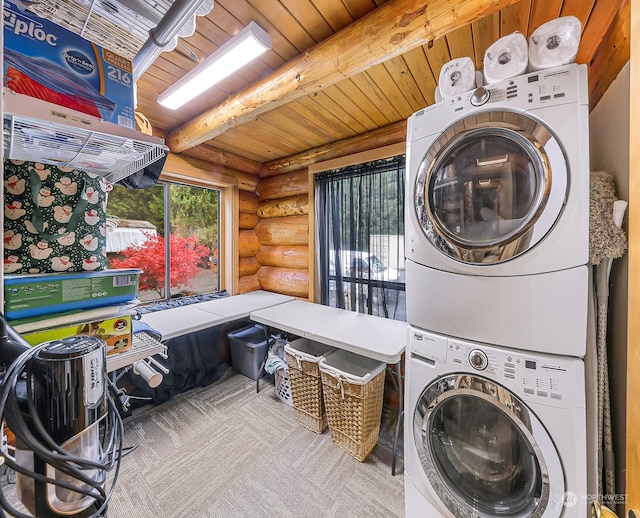 laundry room featuring stacked washer / drying machine, wooden ceiling, carpet floors, and log walls