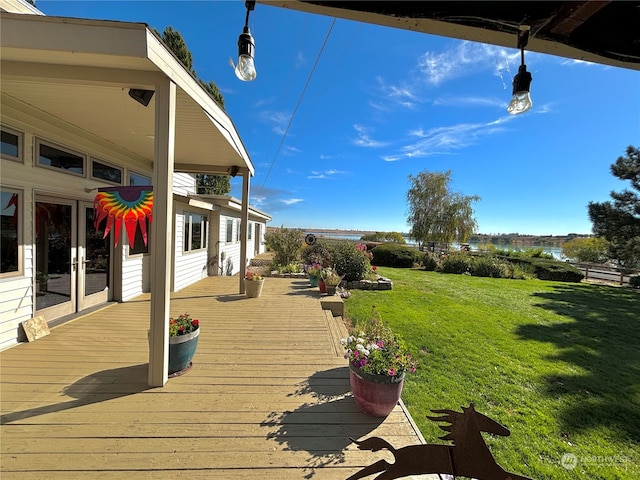 deck featuring a lawn