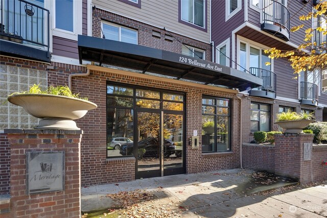 property entrance with a balcony