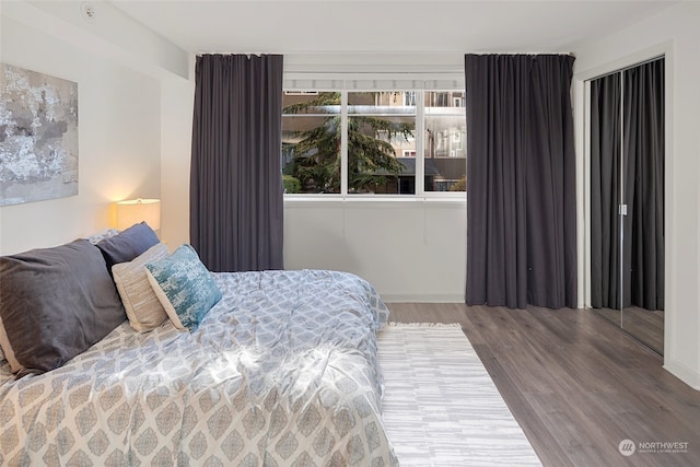 bedroom featuring hardwood / wood-style floors