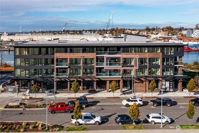 view of building exterior featuring a water view