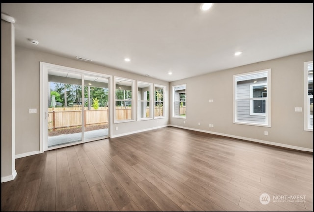 unfurnished living room with light hardwood / wood-style floors