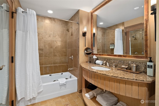 bathroom with vanity and shower / tub combo