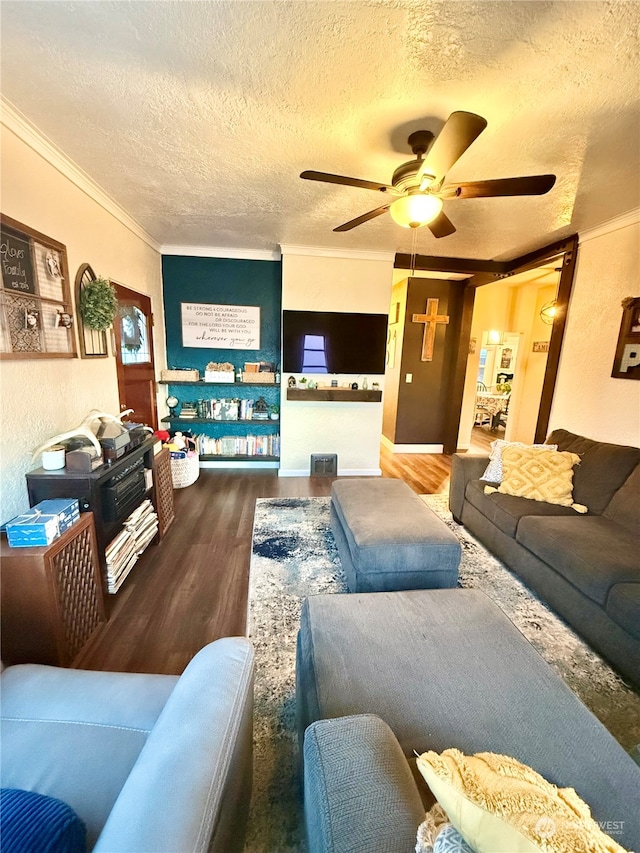 living room with hardwood / wood-style flooring and a textured ceiling