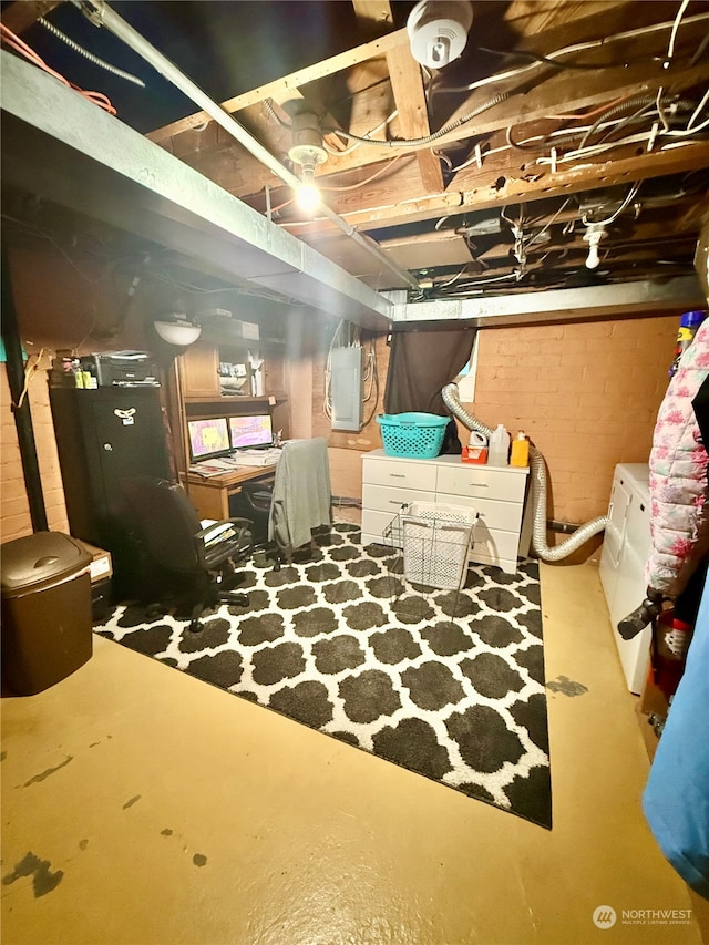 basement with separate washer and dryer