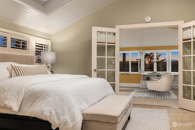 carpeted bedroom featuring vaulted ceiling and wooden ceiling