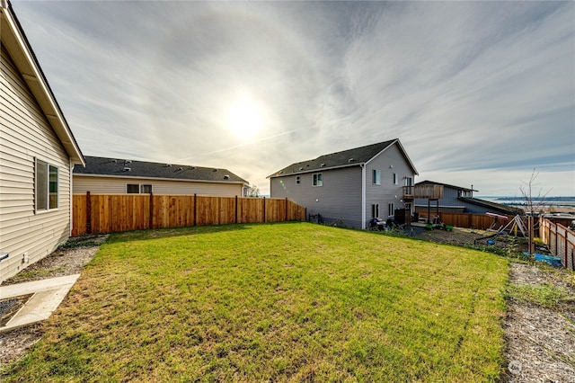 view of yard featuring a fenced backyard