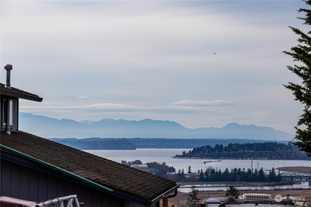 mountain view featuring a water view