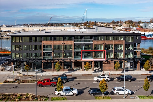 view of building exterior featuring a water view