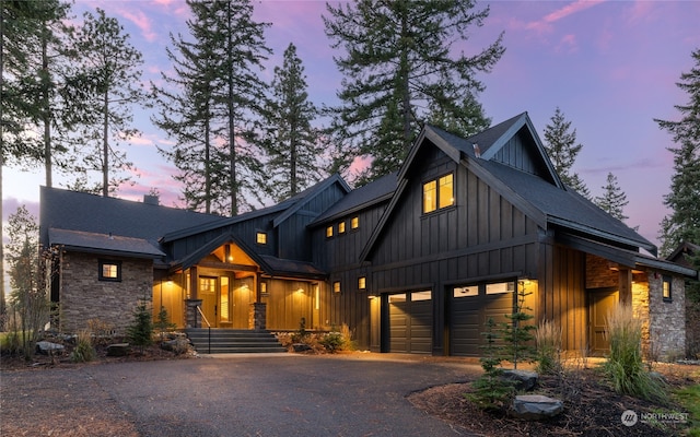 modern farmhouse featuring a garage