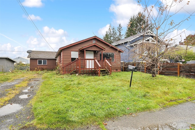 view of front of house with a front lawn