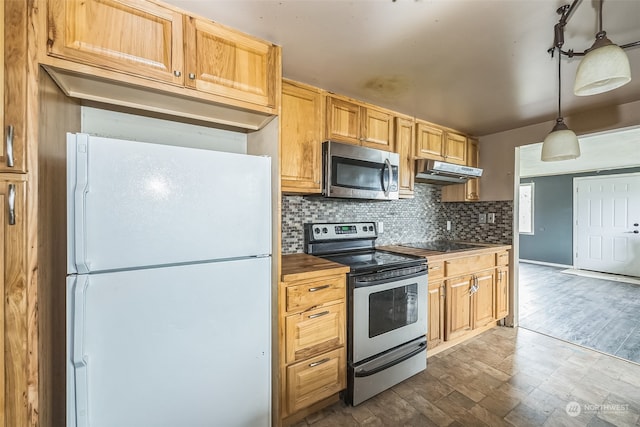 kitchen with decorative backsplash, appliances with stainless steel finishes, light brown cabinetry, decorative light fixtures, and hardwood / wood-style flooring