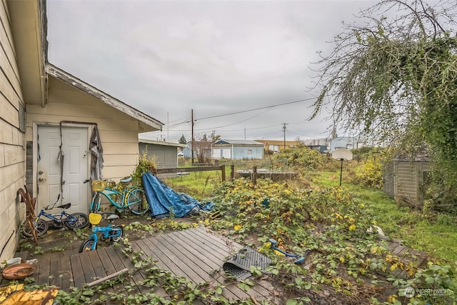 view of yard featuring a wooden deck