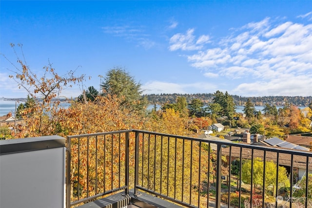 balcony featuring a water view