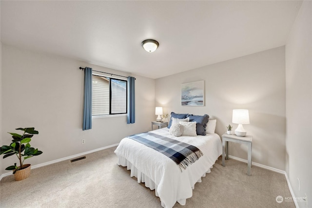 1302 3rd St SE Unit 1, Auburn, WA 98002 - bedroom featuring light colored carpet and baseboards