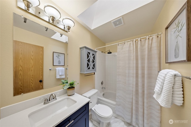 full bathroom featuring toilet, vanity, a skylight, and shower / bathtub combination with curtain