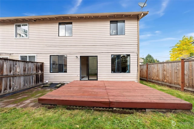 1302 3rd St SE Unit 1, Auburn, WA 98002 - rear view of house with a fenced backyard and a deck