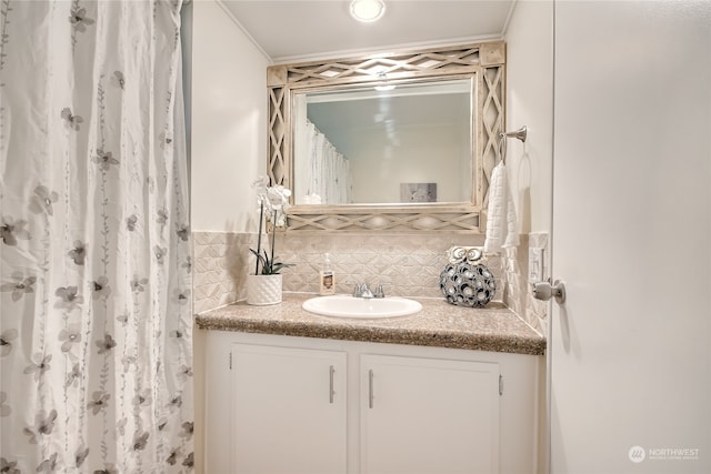 bathroom featuring backsplash and vanity