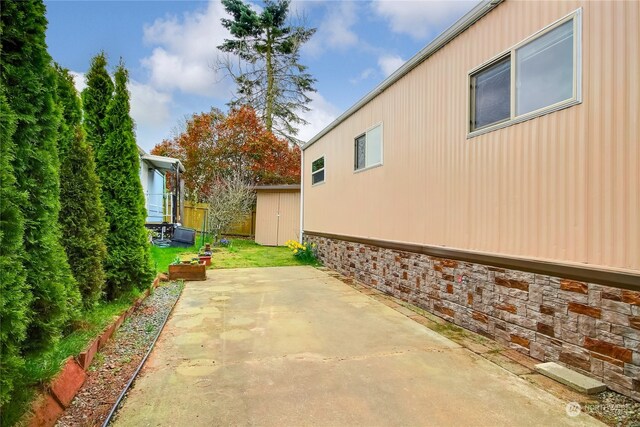 view of home's exterior with a patio